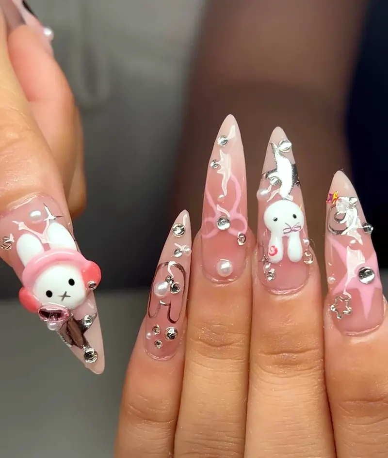 Pink stilettos with a 3D white rabbit in a pink hat, little bunnies and pearls